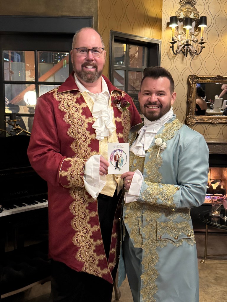 Two guys dressed in regency attire with their tehremy live guest sketch